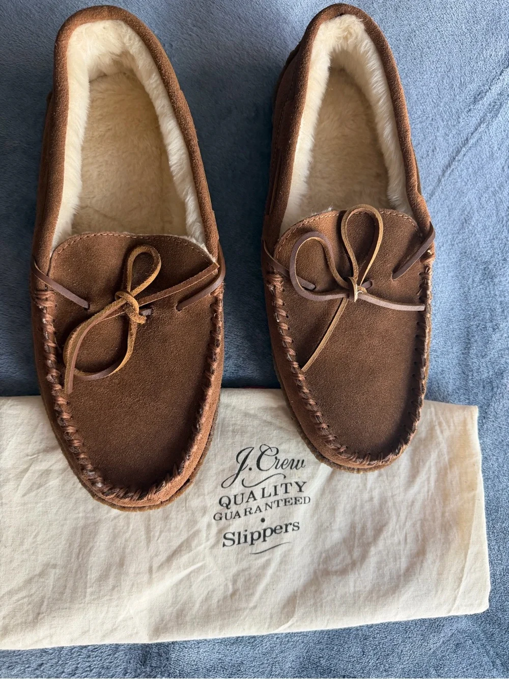 J.Crew slippers feature a warm shearling lining and a classic moccasin